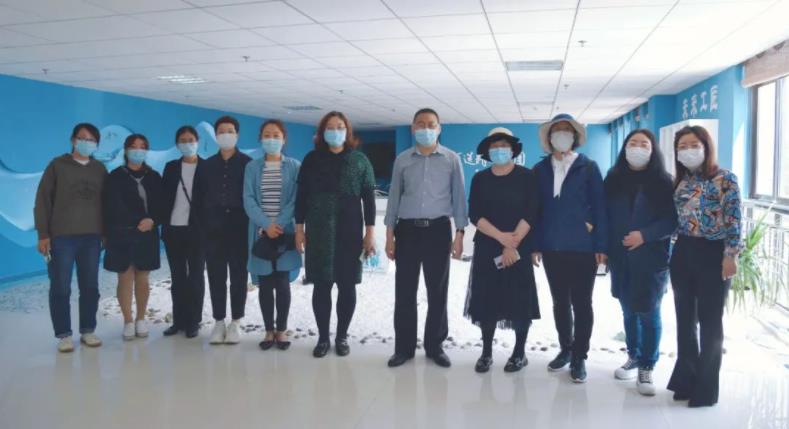 荣成市第二十七中学李尚龙一行到访明德学院